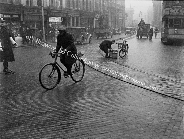 GRAFTON STREET CYCLIST DONNYBROOK TRAM